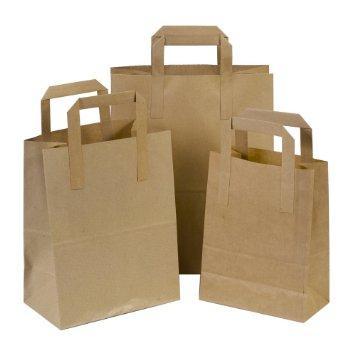“Brown paper carrier bag with tape handles made from strong kraft paper, eco-friendly and recyclable”